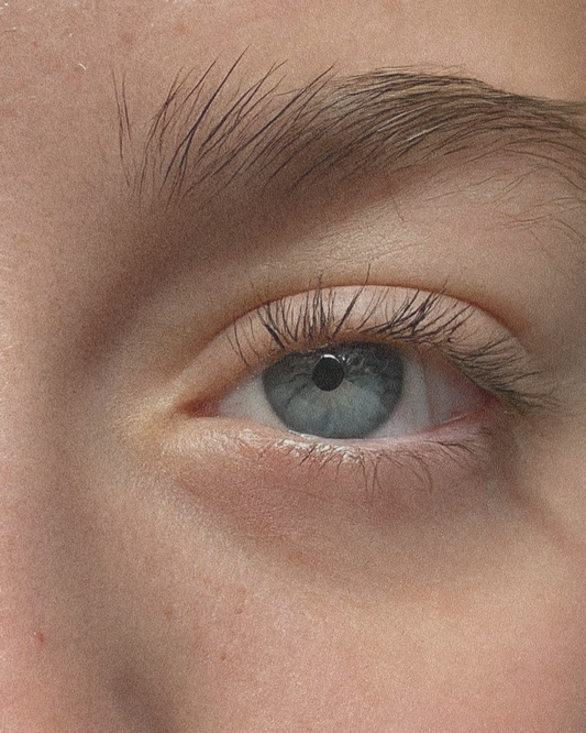 woman eye castor oil